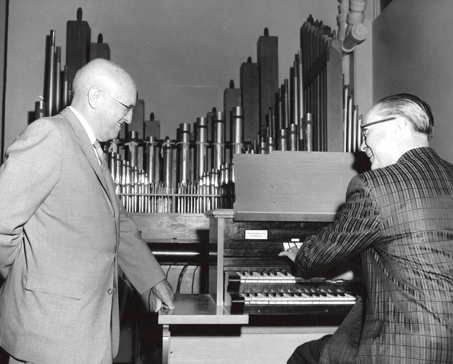 1966 photograph of Music Department. University President Theophilus and Hall Macklin with the new practice organ. Donor: Publications Dept. [PG1_222-076]