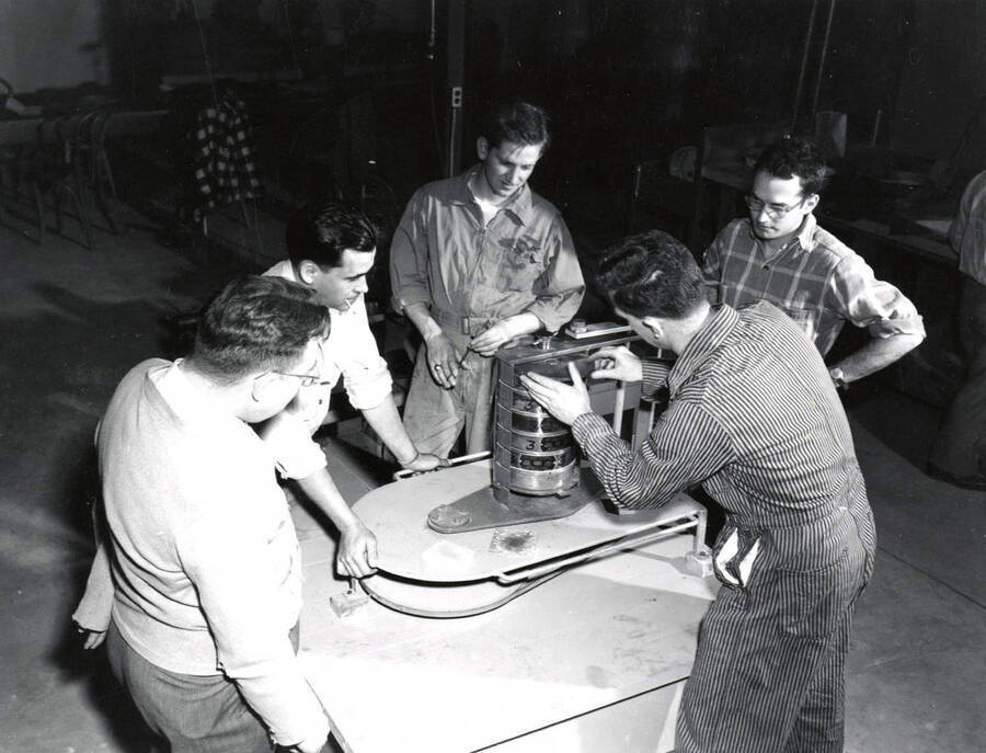 1953 photograph of College of Mines. Students working on their class project. [PG1_223-13]