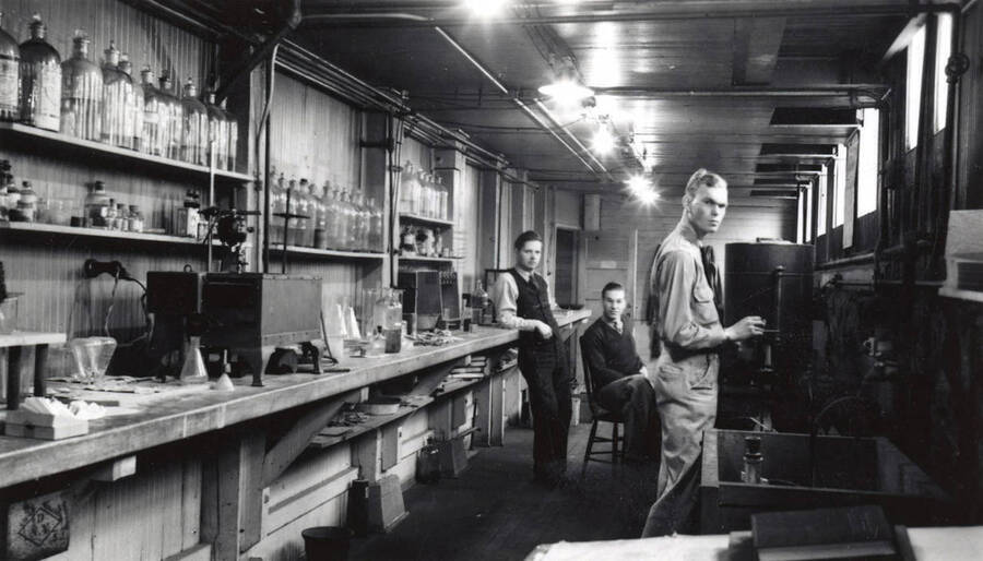 1936 photograph of College of Mines. Students working in the Metallurgical chamical laboratory. Donor: John B. Miller. [PG1_223-26]