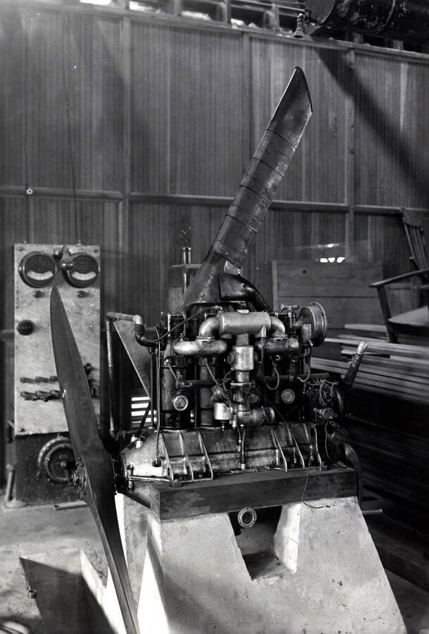 1939 photograph of College of Engineering. An airplane engine in the shop. [PG1_224-19]