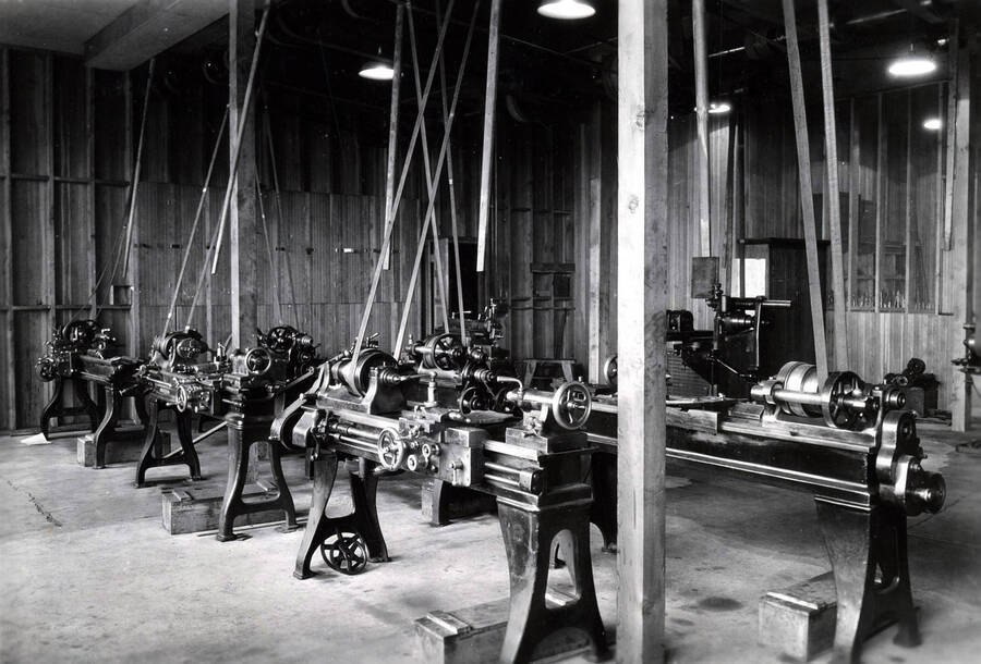 1939 photograph of College of Engineering. Metal lathes in a shop. [PG1_224-20]