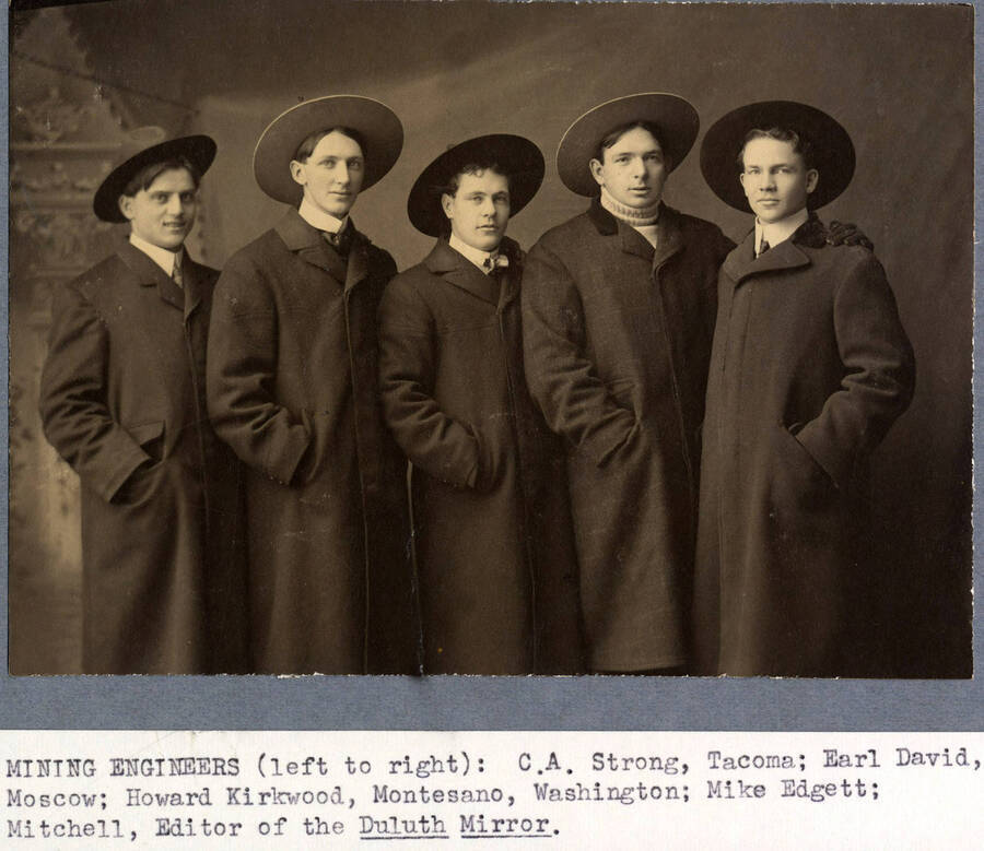 1902 photograph of College of Engineering. Mining engineering students C.A. Strong, Earl David, Howard Kirkwood, Mike Edgett, Mitchell in hats. Donor: Earl David. [PG1_224-24]