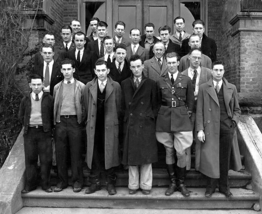 1933 photograph of College of Engineering. Mechanical engineering students on the steps of a building. [PG1_224-42]