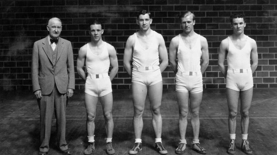 1934 photograph of Physical Education. Coach Ralph Hutchison, Harry Wilson, Earl Ritzheimer, Adam Czehatowski, and Wayne Hill. [PG1_230-04]