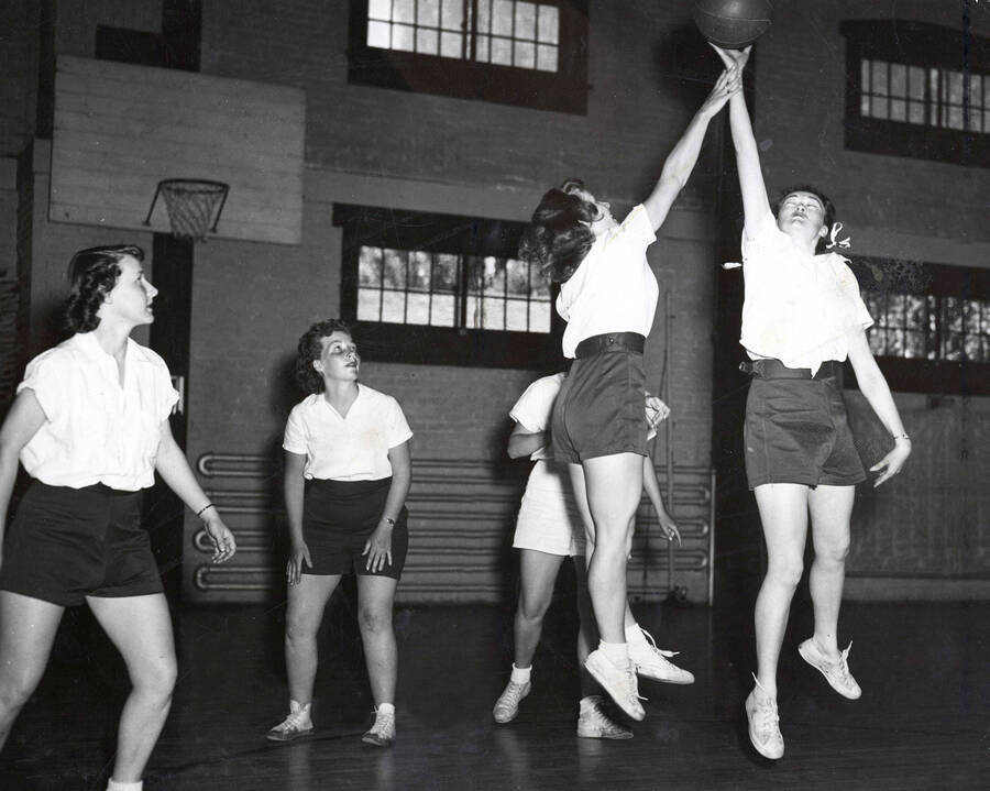 1949 photograph of Physical Education. Women's basketball. Donor: Publications Dept. [PG1_231-11]