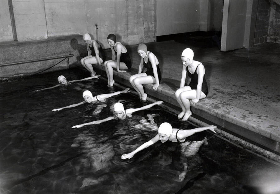 1936 photograph of Physical Education. Female students swimming. [PG1_231-06]