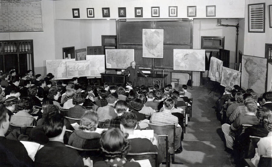 1940 photograph of European history class. Students attending a lecure hall in the Science Hall. Donor: Brosnan papers. [PG1_233-02]