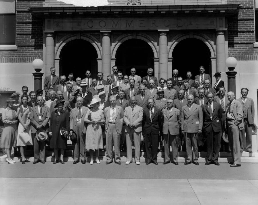1940 photograph of Agricultural Extension Service. Conference group photograph. 58 people are indentified on the back of the photograph. Back Row (left to right): Horace G. Boldter (Montana), Wm. C. Ockey (Washington D.C.), C. O. Youngstrom (Idaho), O. T. McWhorter (Oregon), Thomas E. Buckman (Nevada), N. D. Thomas (Oregon), B. H. Crocheron (California), Chas. Pickrell (Arizona), J. M. Clifford (Oregon), H. H. White (Oregon), D. C. Mumford (Oregon); Row 4 (left to right): H. W. Gilbertson (Washington D.C.), L. H. Cline (Nevada), R. S. Besse (Oregon), R. M. Turner (Washington), Howard R. Baker (Arizona), M. Irene Leach (Oregon), Mabel Mack (Oregon), Paul Carpenter (Oregon), Buena Maris (Oregon), Effie S. Barrows (Utah); Row 3 (left to right): N. L. Bennion (Oregon), Mary Rokahr (Washington D.C.), Hellen Gillette (Nevada), Jean Warren (California), Arthur J. Cagle (Washington), J. C. Taylor (Montana), K. E. Morrison (Wyoming), J. R. Beck (Oregon), W. W. Owens (Utah); Row 2 (left to right): Exine Davenport (Colorado), Virgil Gilman (Washington D.C.), Lois Lutz (Oregon), Marian Hepworth (Idaho), Mrs. T. H. Summers (Colorado), T. H. Summers (Colorado), Ellen Lindstrom (Wyoming), Mary S. Buol (Nevada), J. C. Bower (Montana), A. E. Bowman (Wyoming), Esther Pond (Washington), Arthur Shultis (California), John B. Schneider (California), Chas. W. Smith (Oregon), Paul Eke (Idaho); Row 1 (left to right): M. Elmina White (Washington), Miss Taylor (Montana), Fred Jans (Colorado), Margaret H. Tuller (Montana), A. B. Fite (New Mexico), Azalea Sager (Oregon), M. L. Wilson (Washington D.C.), Wm. A Schoenfeld (Oregon), E. J. Iddings (Idaho), F. E. Balmer (Washington), Wm. L. Tautsch (Oregon), H. W. Hochbaum (Washington D.C.), and E. R. Jackman (Oregon). Donor: University of Idaho Cooperative Extension System. [PG1_237-11]
