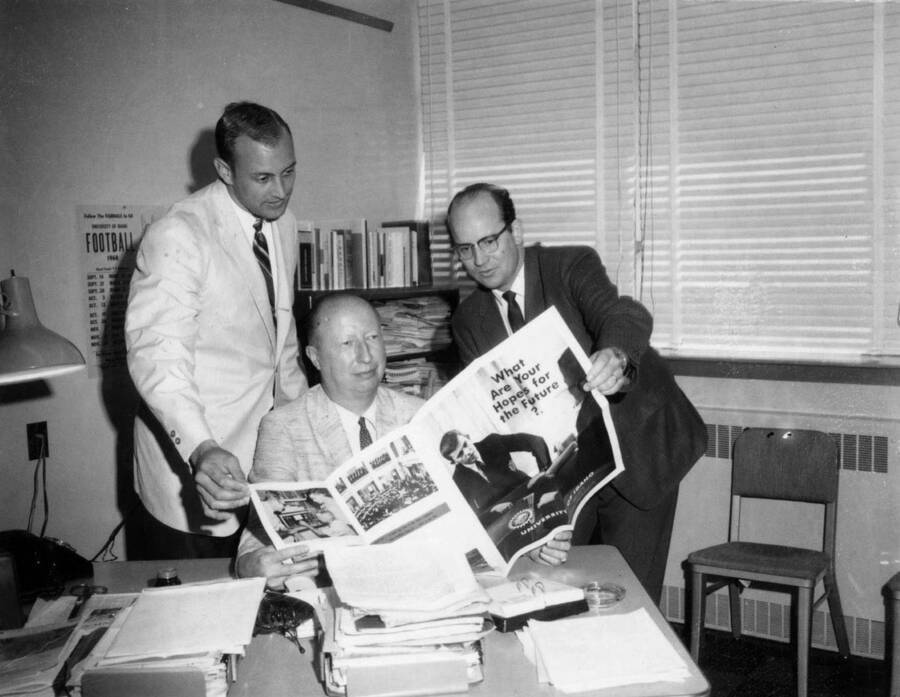 1968 photograph of Publications Department. Ray Cauwet, Rafe Gibbs, and Leo Ames. [PG1_238-02]
