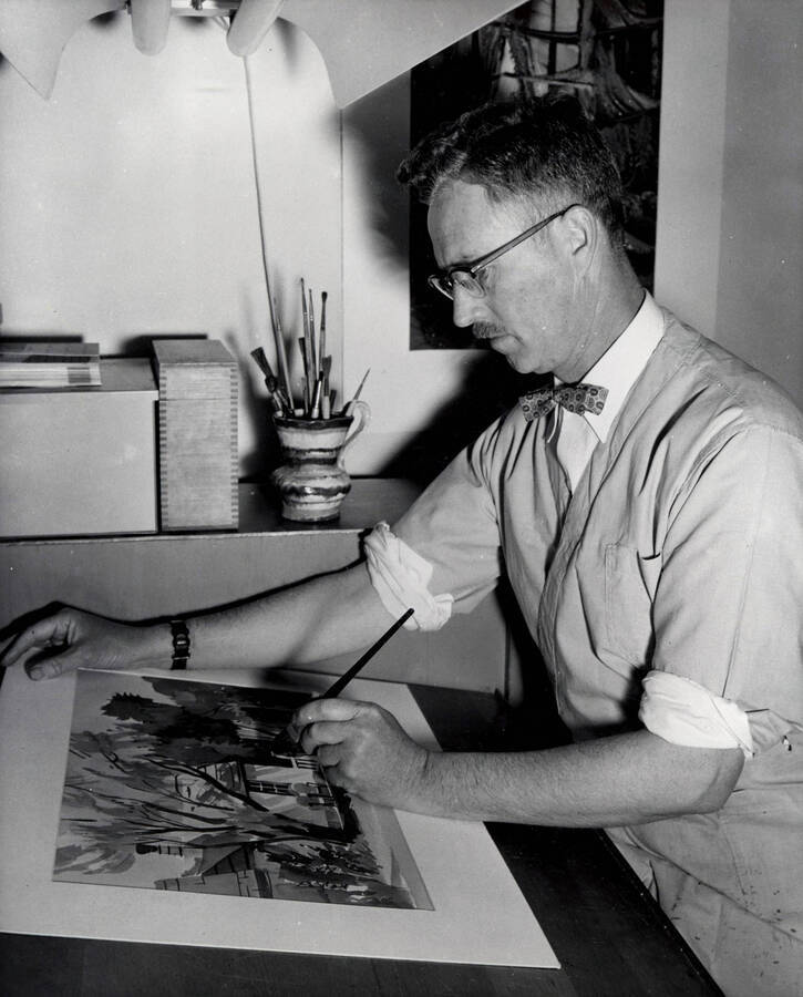 1965 photograph of Art and Architecture. Alfred Dunn painting in a studio. Donor: Publications Dept. [PG1_241-09]