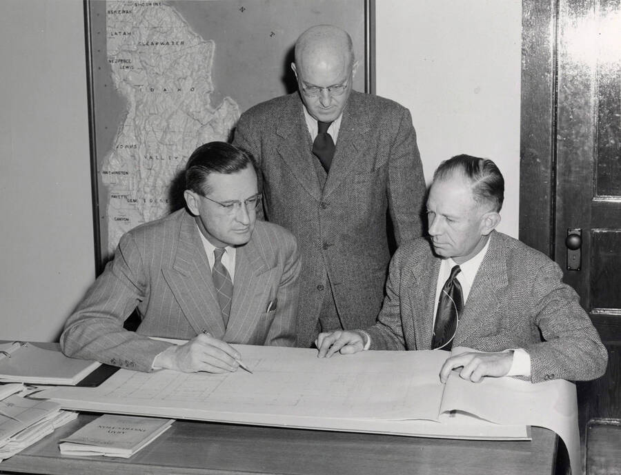 University of Idaho Regent John David Remsberg, Jr., visits Jesse E. Buchanan (left) and Donald R. Theophilus (center). [245-3]