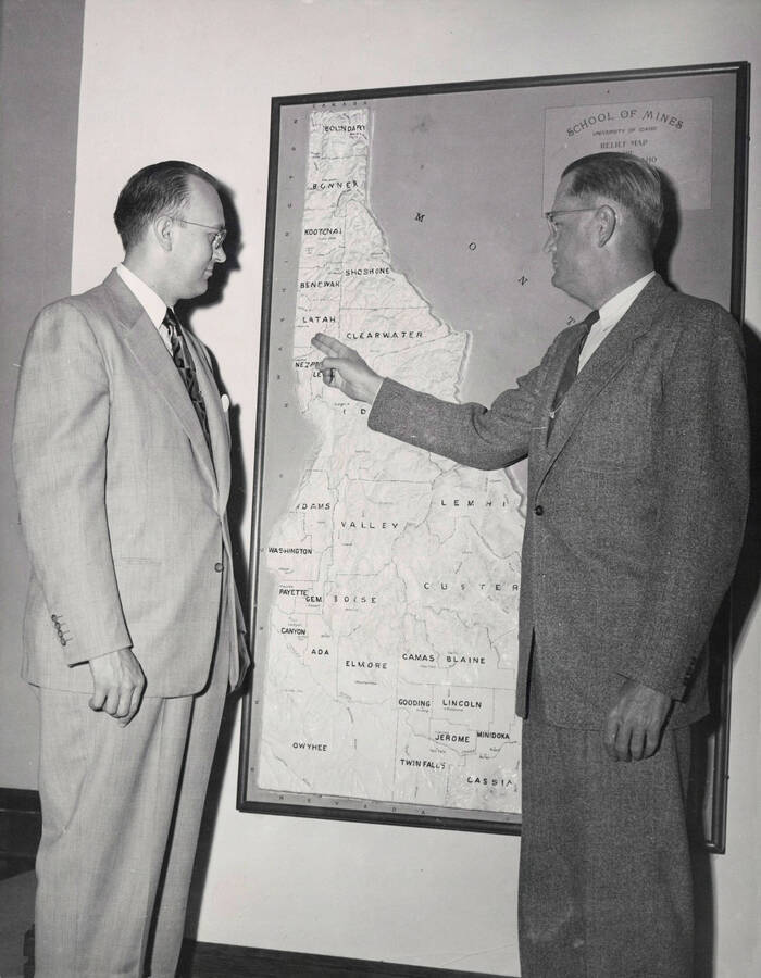 1950 photograph of Administrative Executive Committee. President Buchanan and Earl Cook. Donor: Publications Dept. [PG1_245-04]