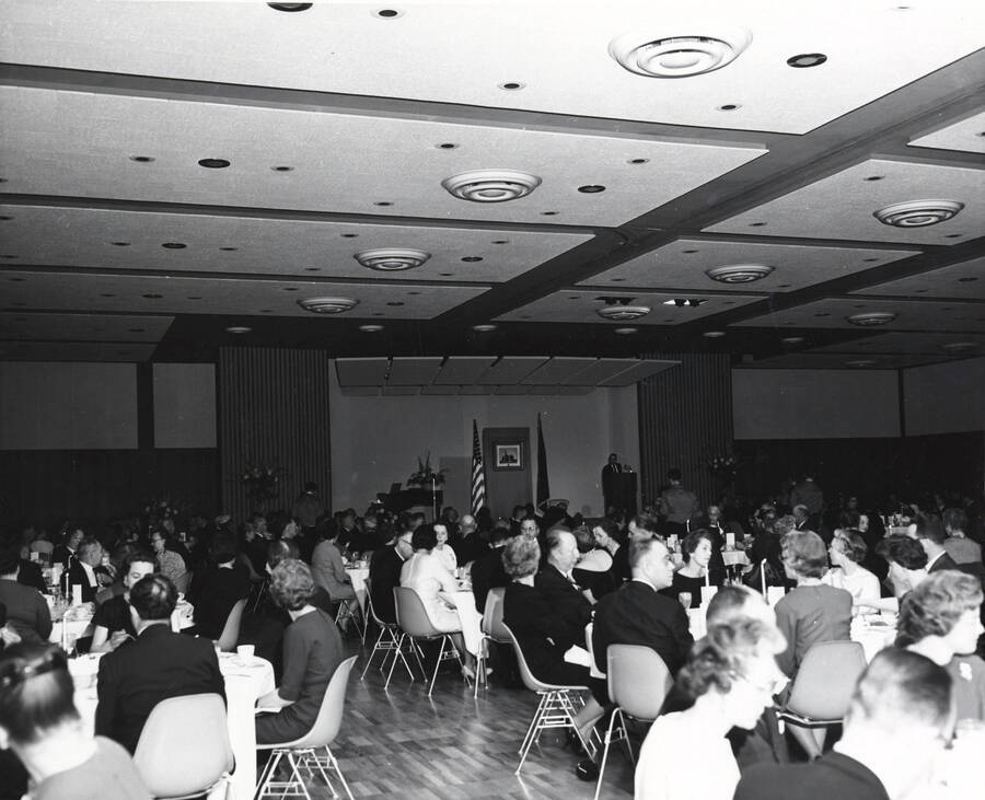 1964-01-30 photograph of 75th Anniversary. People seated in a ballroom during the 75th Anniversary Banquet. [PG1_246-21]