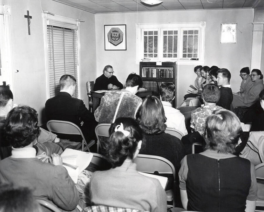 1950 photograph of Religious Education. Students studying during class. Donor: Publications Dept. [PG1_249-01]