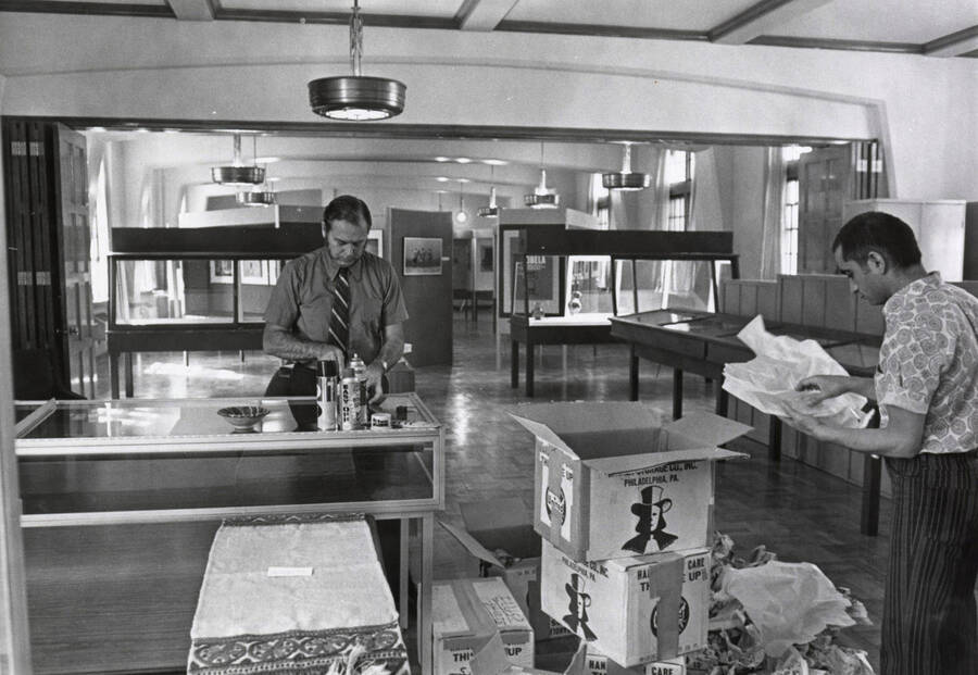 1966 photograph of Museum. Ellis Burcaw setting up displays. [PG1_251-05]