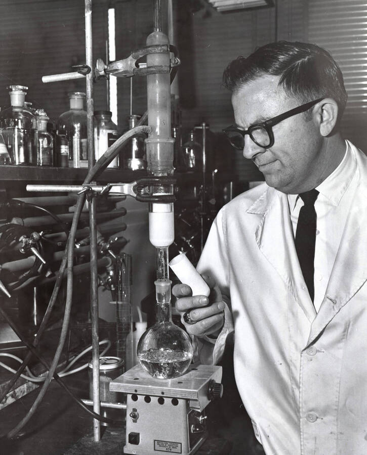 1968 photograph of Bacteriology. Duane LeTorneau operating experimental equipment. [PG1_253-01]