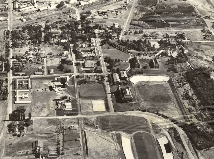 1938 photograph of University of Idaho campus. Aerial view shows both the baseball diamond and Neale Stadium. [PG1_003-12]