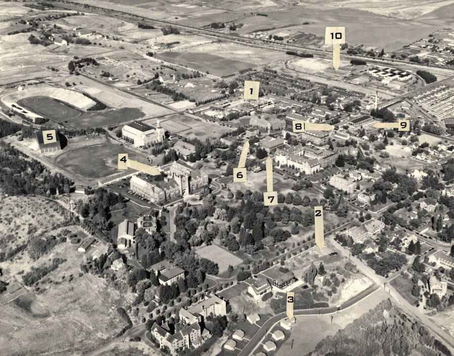 1950 photograph of University of Idaho campus. Arrows identify buildings. [PG1_003-14a]