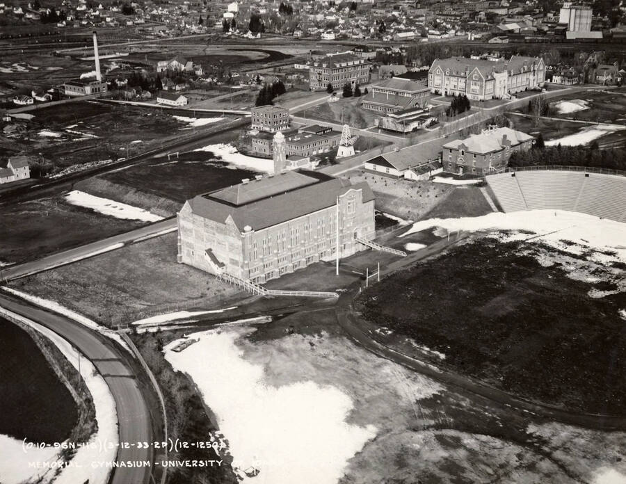 1933-03-13 photograph of University of Idaho campus. Aerial view shows Memorial Gym in center. Donor: Publications Dept. [PG1_003-20]