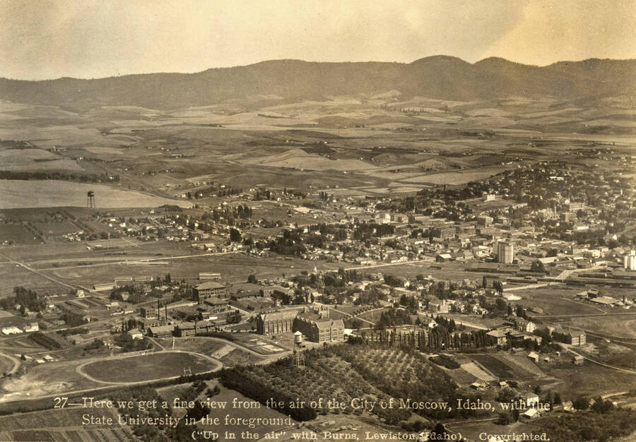 1922 photograph of University of Idaho campus. Aerial view shows both campus and Moscow. Donor: Stewart Cato. [PG1_003-25]