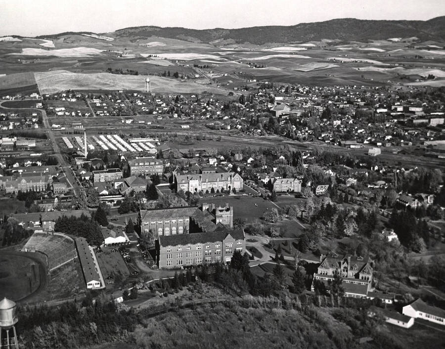 1931 photograph of University of Idaho campus. Aerial view shows both campus and Moscow. [PG1_003-32]