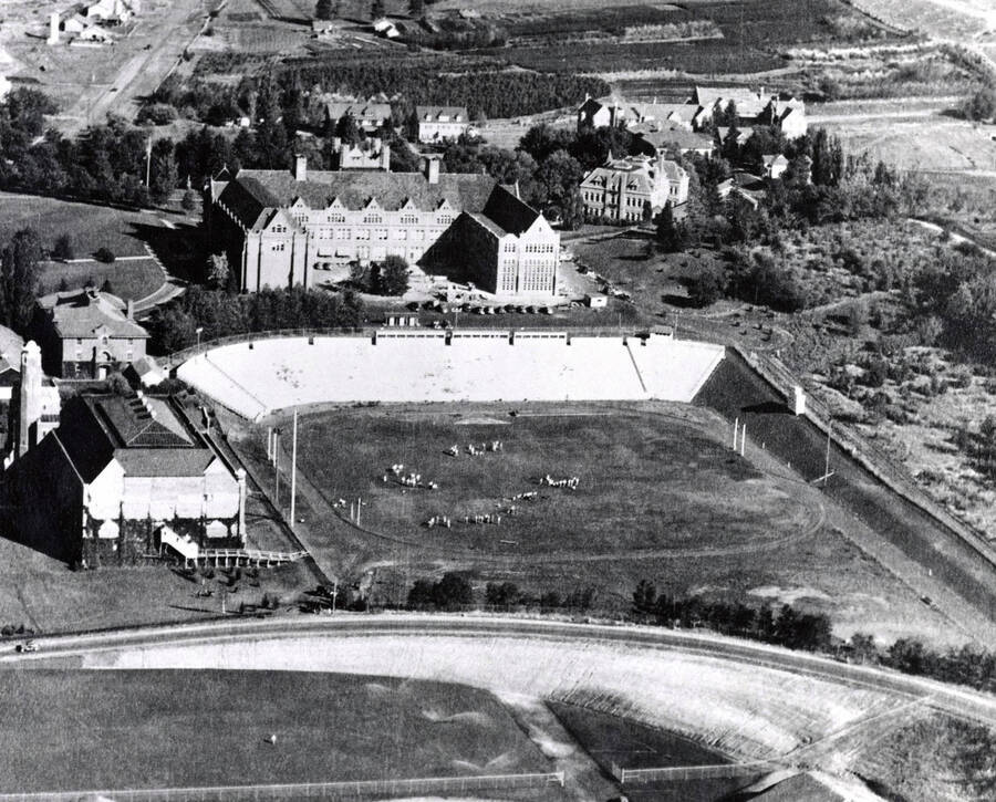 1939 photograph of University of Idaho campus. Aerial view shows the grandstands. [PG1_003-06]