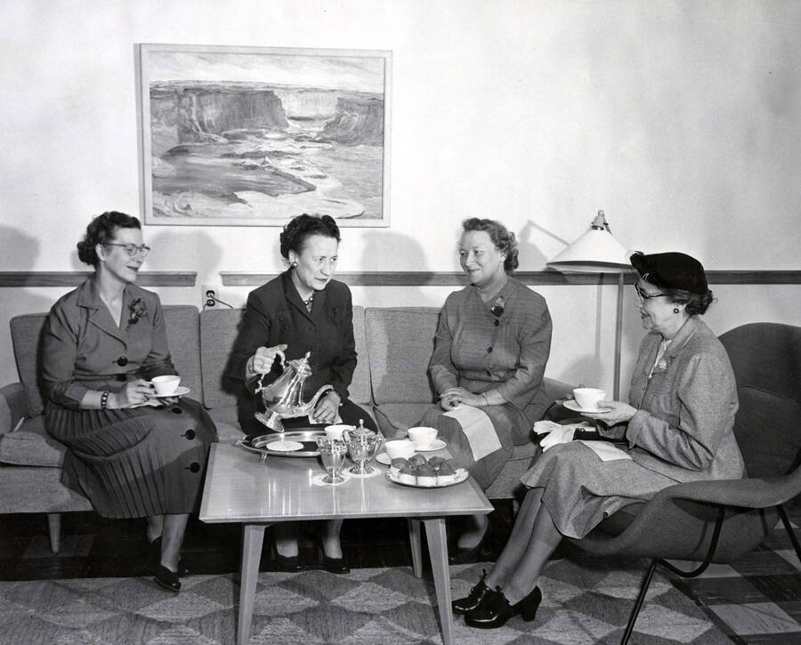 1950 photograph of Gifts. l-r: Mrs. Carl Cunningham, Margaret Ritchie, Mrs. P.D. Wickward, and Mrs. D.R. Theophilus. [PG1_400-01]