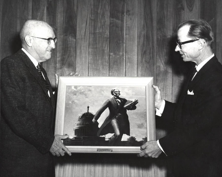 1962 photograph of Gifts. l-r: President Theophilus, G.H. Michalk. Donor: Publications Dept. [PG1_400-31]