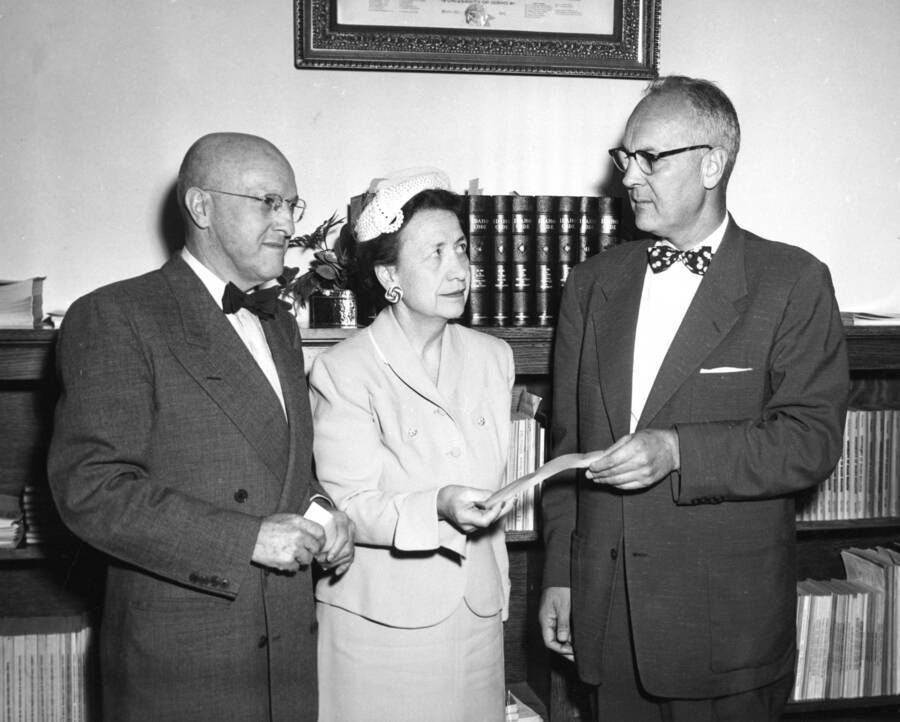 1954 photograph of Gifts. l-r: Dr. Theophilus; Margaret Ritchie; J. A. McArthur, Lewiston Sears. Donor: Publications Dept. [PG1_400-33]