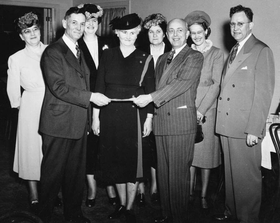1948 photograph of Gifts. Governor C. A. Robbins presenting Amecian Cancer Society check for cancer research. Donor: Publications Dept. [PG1_400-36]