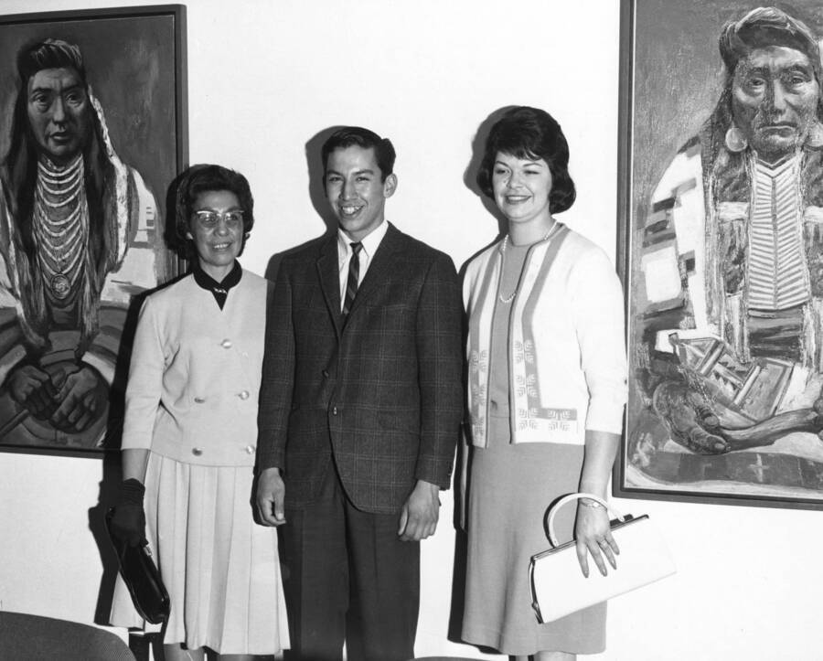 1965 photograph of Gifts. Paintings of Nez Perce Chiefs Lawyer and Joseph by Howard Cook with unidentified descendents of Lawyer and Joseph. [PG1_400-46b]