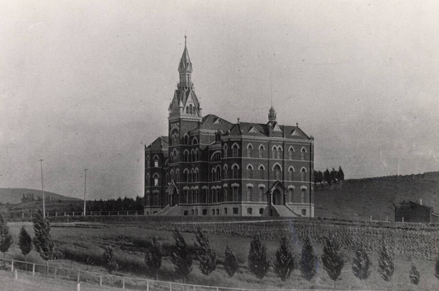 1900 photograph of Administration Building. View of the old administration Building and lawn.[PG1_51-16]