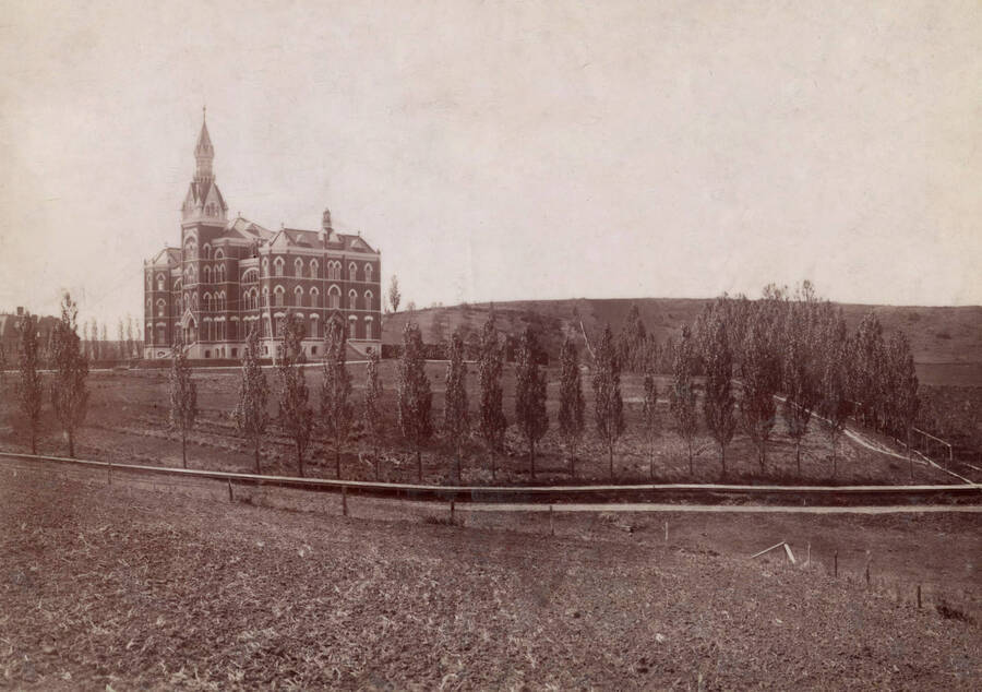 1902 photograph of Administration Building. View of the old administration Building and lawn. [PG1_51-20]
