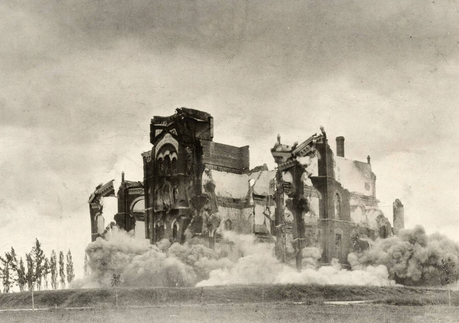 1906 photograph of Administration Building. View of dynamiting the walls after the fire. [PG1_51-30a]