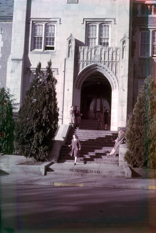 1920 photograph of Science Hall. View of student at entrance. [PG1_52-145a]