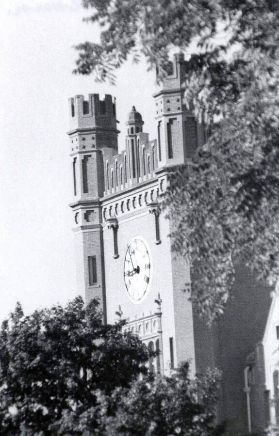 1940 photograph of Administration Building hand tinted. View of the clock tower. [PG1_52-178]