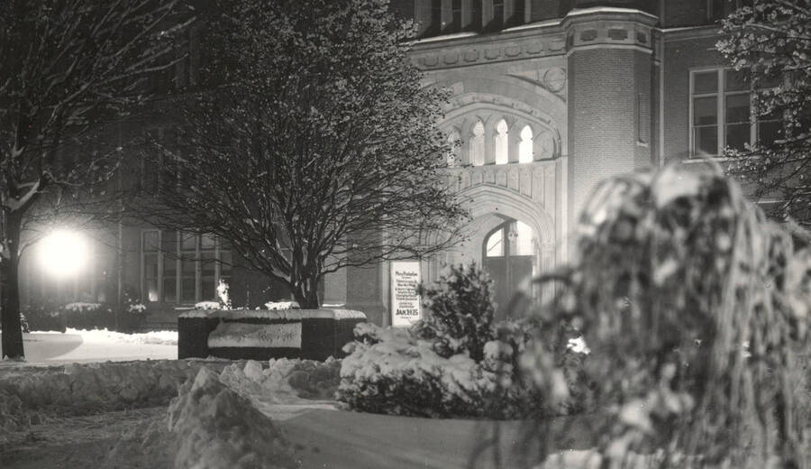 Administration Building, University of Idaho front entrance at night in winter. [52-41]