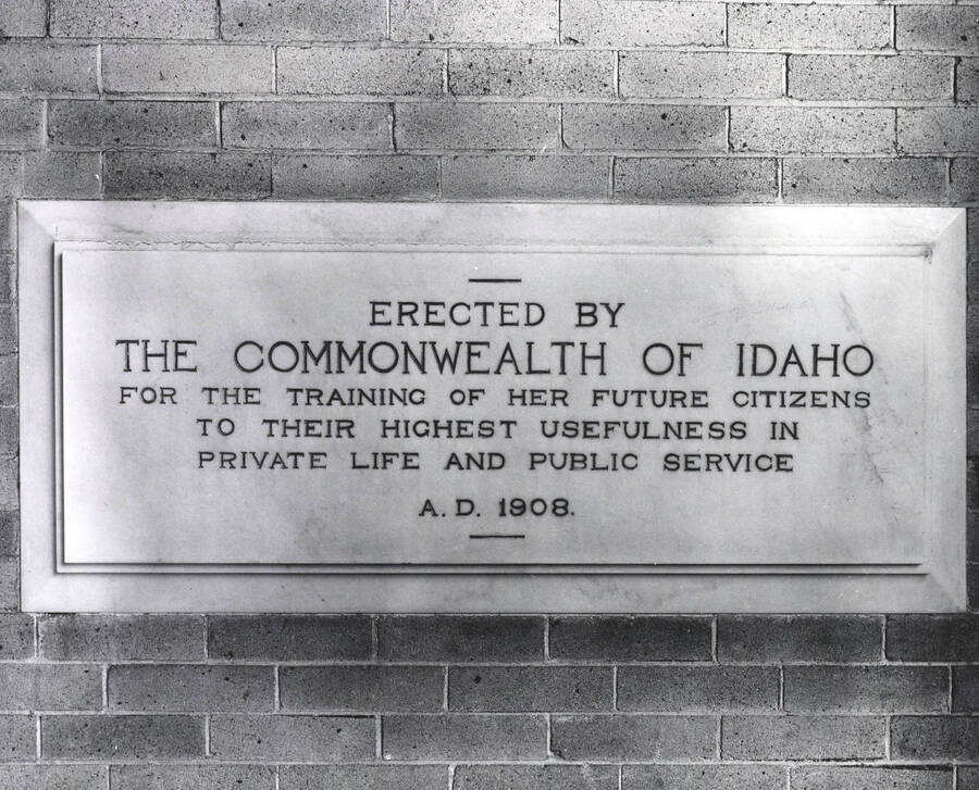 1961 photograph of Administration Building. A close up of the 1908 Dedicatory plaque. [PG1_52-054]
