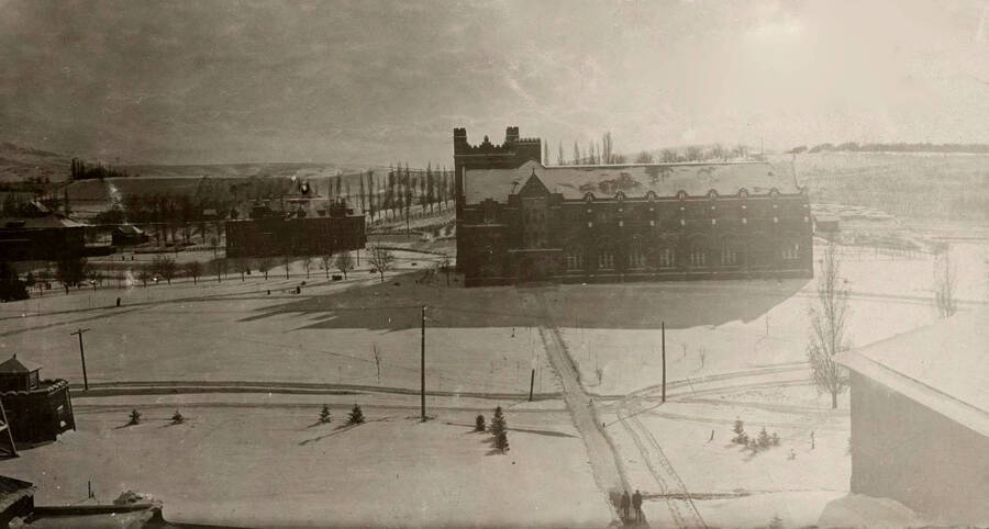 1912 photograph of Administration Building. View of Administration lawn in the winter. [PG1_52-006]