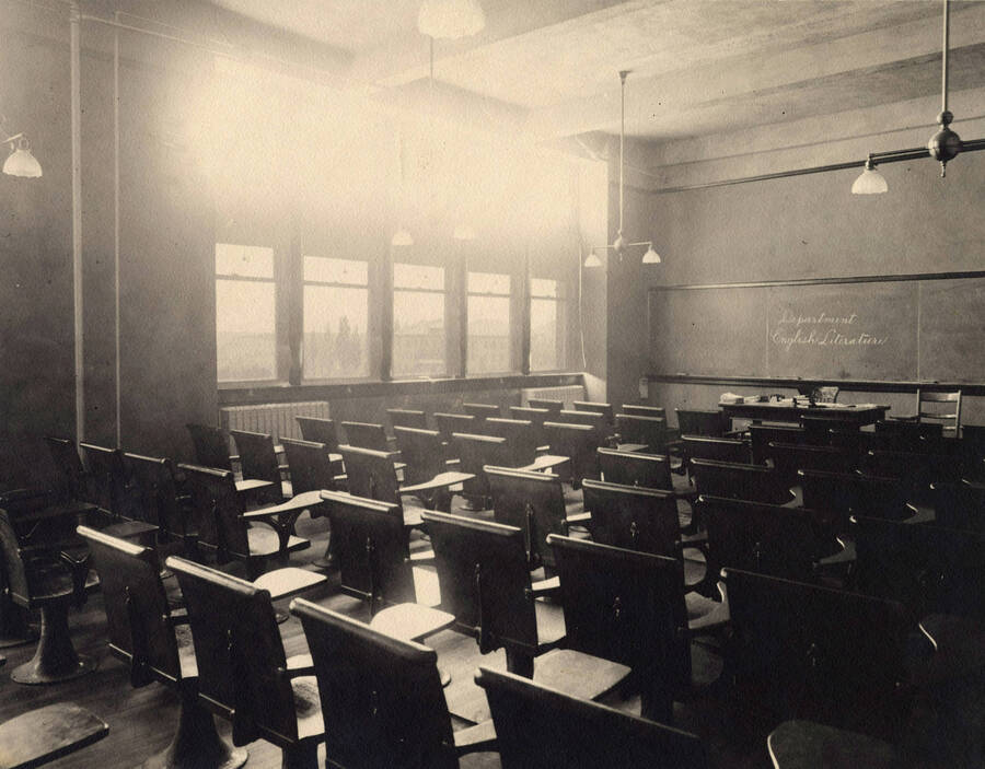 1910 photograph of Administration Building. View of classroom. [PG1_52-072]