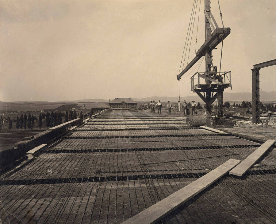 1908 photograph of Administration building construction. Morrill Hall may be seen in the distance. Donor: Marie Skog. [PG1_52-073]