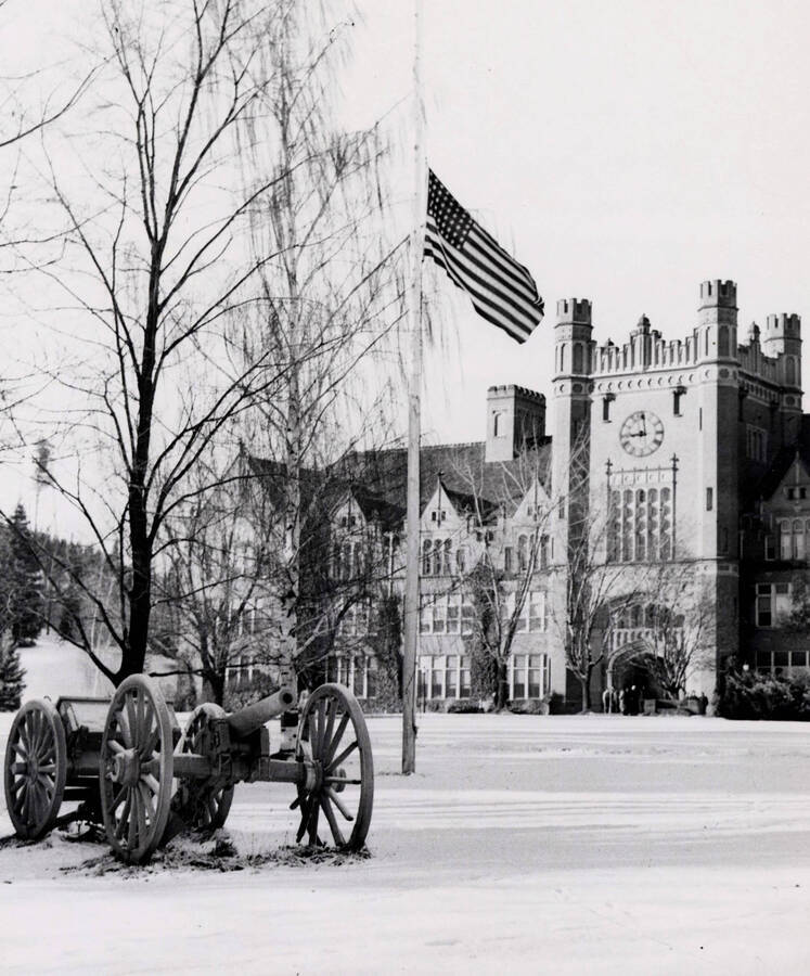 Administration Building, University of Idaho winter scene with cannon. [52-86]