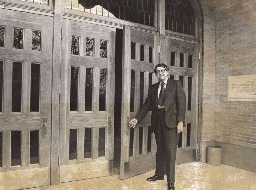 1970 photograph of Administration Building. View of Vice-president Robert W. Conrad at entrance. [PG1_52-099]