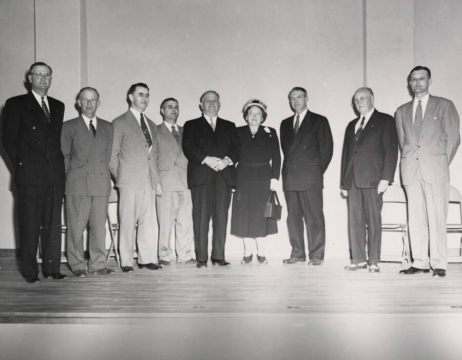 1951 photograph of Engineering Classroom Building l-r: J.Buchanan, John D. Remsburg, J.L. McCarthy, A.B. Jones, Emory Owen, Marguerite Campbell, Len Jordan, Judge McNaughton, Allen Janssen. [PG1_57-03]
