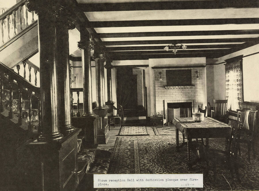 1908 photograph of Ridenbaugh Hall. View of the reception hall with dedication plaque over fireplace. [PG1_58-10]