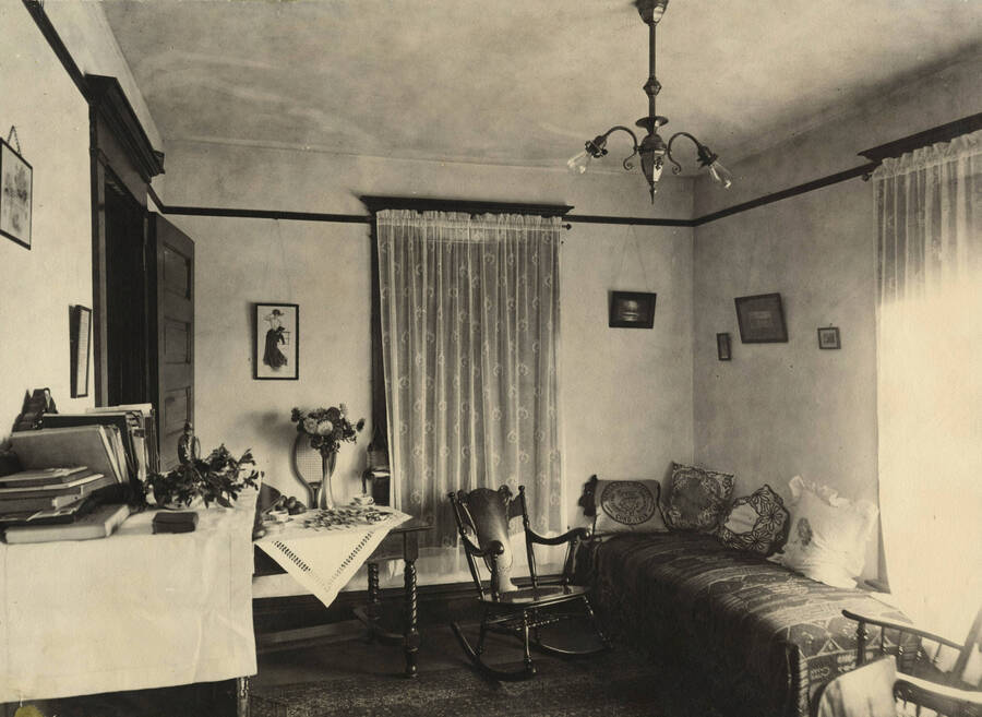 1908 photograph of Ridenbaugh Hall. View of student's room. [PG1_58-15]