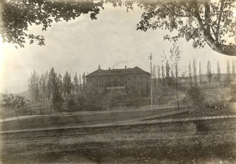 1915 photograph of Ridenbaugh Hall. View from the Administration lawn. Donor: Don R. Besse. [PG1_58-26]