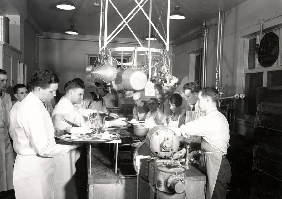 1936 photograph of Hays Hall. View of the kitchen and staff. [PG1_59-10]