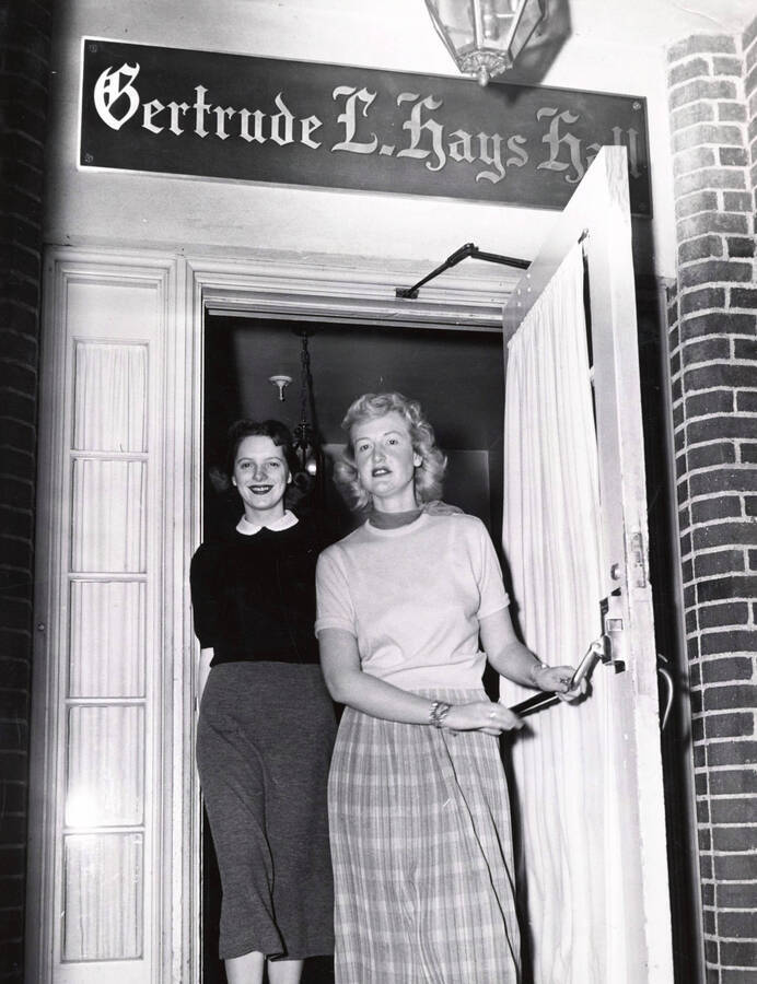 Hays Hall, University of Idaho. Entrance; Patricia Gustafson and Joyce Lytle. [59-12]