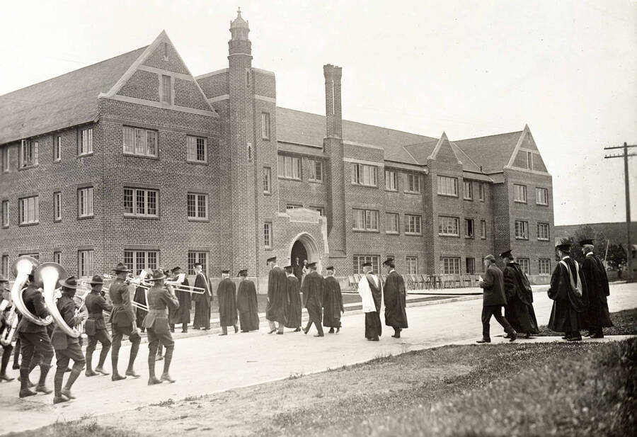 1923-06-11 photograph of Forney Hall. View of military band on the way to the dedication.[PG1_60-11]